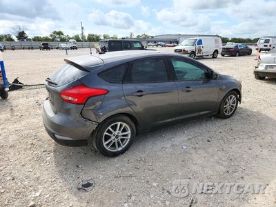 Trzecie zdjęcie samochodu z tyłu: 2018 FORD FOCUS SE VIN:1FADP3K25JL321700 - miniatura