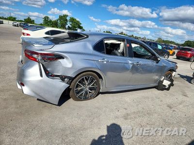 Trzecie zdjęcie samochodu z tyłu: 2024 TOYOTA CAMRY SE VIN:4T1T11AK6RU843282 - miniatura