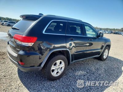 Trzecie zdjęcie samochodu z tyłu: 2014 JEEP GRAND CHEROKEE LAREDO VIN:1C4RJFAG7EC118104 - miniatura