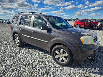 Czwarte zdjęcie samochodu z boku: 2012 HONDA PILOT TOURING VIN:5FNYF4H96CB055134 - miniatura