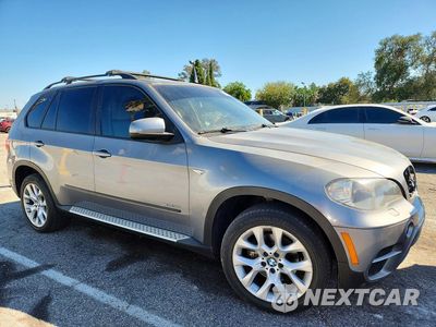 Czwarte zdjęcie samochodu z boku: 2011 BMW X5 XDRIVE35I VIN:5UXZV4C54BL410212 - miniatura