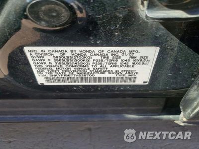 Zdjęcie 13 z 13 samochodu: 2007 HONDA PILOT EXL VIN:2HKYF18677H528700 - miniatura