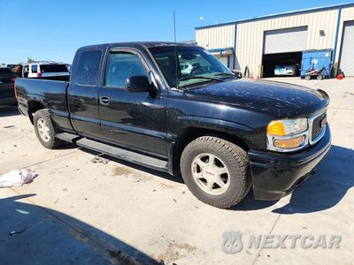 Czwarte zdjęcie samochodu z boku: 2001 GMC SIERRA K1500 C3 VIN:2GTEK69U111354124 - miniatura