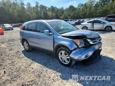 Czwarte zdjęcie samochodu z boku: 2010 HONDA CR-V EXL VIN:JHLRE4H75AC013184 - miniatura