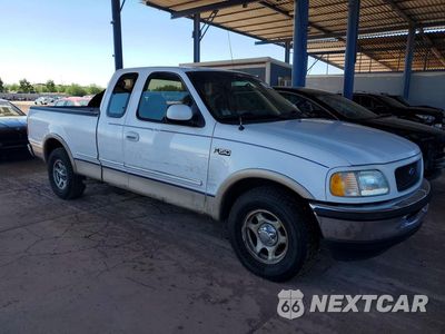 Czwarte zdjęcie samochodu z boku: 1997 FORD F150 VIN:1FTEX17L6VKB90227 - miniatura