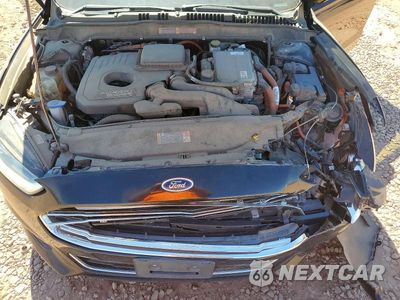 Zdjęcie 11 z 13 samochodu: 2016 FORD FUSION TITANIUM PHEV VIN:3FA6P0SU1GR141911 - miniatura