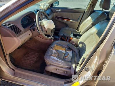 Zdjęcie 7 z 12 samochodu: 2002 TOYOTA CAMRY XLE VIN:4T1BE30K92U625033 - miniatura
