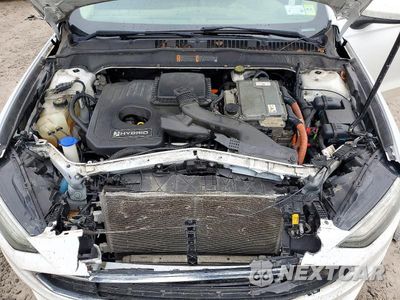 Zdjęcie 11 z 12 samochodu: 2018 FORD FUSION SE HYBRID VIN:3FA6P0LU1JR249144 - miniatura