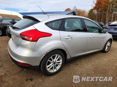 Trzecie zdjęcie samochodu z tyłu: 2016 FORD FOCUS SE VIN:1FADP3K22GL240100 - miniatura