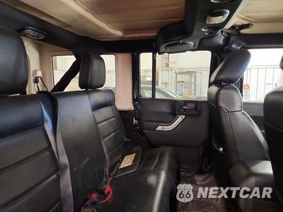 Zdjęcie 11 z 13 samochodu: 2012 JEEP WRANGLER UNLIMITED SAHARA VIN:1C4HJWEG4CL240891 - miniatura