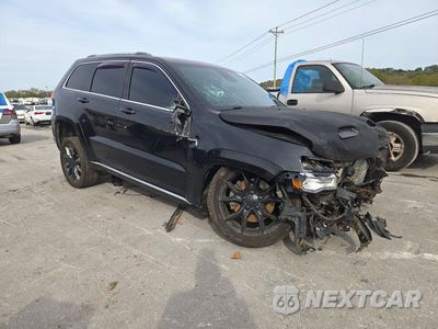 Czwarte zdjęcie samochodu z boku: 2015 JEEP GRAND CHEROKEE SUMMIT VIN:1C4RJFJTXFC608230 - miniatura