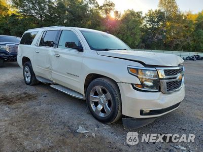 Czwarte zdjęcie samochodu z boku: 2015 CHEVROLET SUBURBAN C1500 LTZ VIN:1GNSCKKC9FR136562 - miniatura