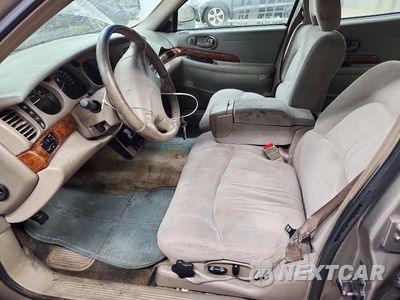 Zdjęcie 7 z 12 samochodu: 2001 BUICK LESABRE LIMITED VIN:1G4HR54KX1U218860 - miniatura