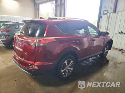 Trzecie zdjęcie samochodu z tyłu: 2018 TOYOTA RAV4 XLE VIN:2T3RFREV6JW853594 - miniatura
