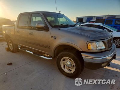Czwarte zdjęcie samochodu z boku: 2001 FORD F150 SUPERCREW VIN:1FTRW08L21KA41059 - miniatura