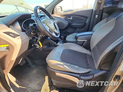 Zdjęcie 7 z 12 samochodu: 2013 HYUNDAI TUCSON GLS VIN:KM8JUCAC2DU623763 - miniatura