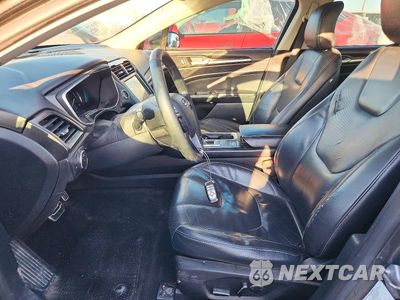 Zdjęcie 7 z 12 samochodu: 2017 FORD FUSION TITANIUM PHEV VIN:3FA6P0SU2HR209845 - miniatura