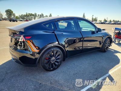 Trzecie zdjęcie samochodu z tyłu: 2022 TESLA MODEL Y VIN:7SAYGDEF1NF403340 - miniatura