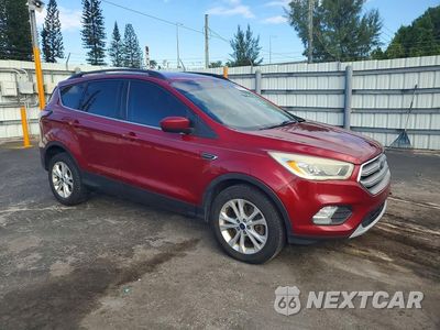 Czwarte zdjęcie samochodu z boku: 2017 FORD ESCAPE SE VIN:1FMCU9GDXHUD92998 - miniatura