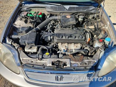 Zdjęcie 11 z 12 samochodu: 2000 HONDA CIVIC LX VIN:1HGEJ6575YL009915 - miniatura