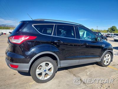 Trzecie zdjęcie samochodu z tyłu: 2016 FORD ESCAPE SE VIN:1FMCU9G99GUC39782 - miniatura