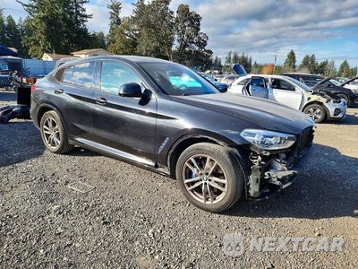 Czwarte zdjęcie samochodu z boku: 2021 BMW X4 XDRIVE30I VIN:5UX2V1C03M9H50555 - miniatura