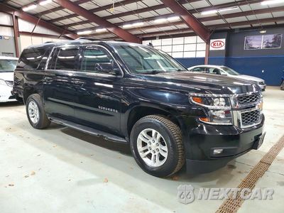 Czwarte zdjęcie samochodu z boku: 2016 CHEVROLET SUBURBAN K1500 LT VIN:1GNSKHKC7GR389516 - miniatura