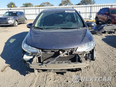 Piąte zdjęcie samochodu w środku: 2017 HONDA FIT LX VIN:3HGGK5G56HM708531 - miniatura