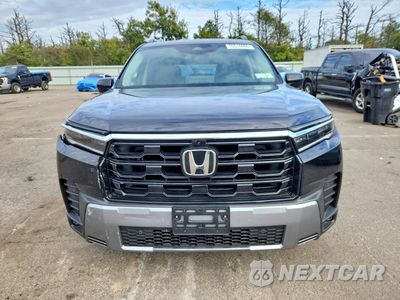 Piąte zdjęcie samochodu w środku: 2026 HONDA PILOT TOURING VIN:5FNYG1H78TB042055 - miniatura