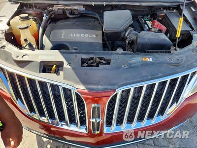 Zdjęcie 12 z 14 samochodu: 2014 LINCOLN MKX VIN:2LMDJ6JK2EBL14854 - miniatura
