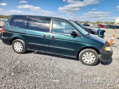 Czwarte zdjęcie samochodu z boku: 2000 HONDA ODYSSEY LX VIN:2HKRL185XYH601421 - miniatura