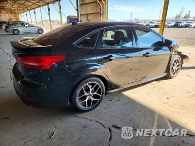 Trzecie zdjęcie samochodu z tyłu: 2015 FORD FOCUS SE VIN:1FADP3F2XFL334590 - miniatura