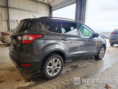 Trzecie zdjęcie samochodu z tyłu: 2017 FORD ESCAPE VIN:1FMCU9GD9HUE35890 - miniatura