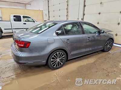 Trzecie zdjęcie samochodu z tyłu: 2016 VOLKSWAGEN JETTA SPORT VIN:3VWD17AJ4GM401196 - miniatura