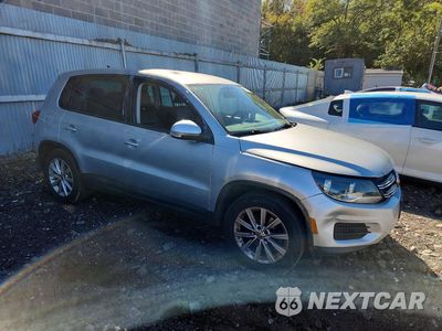 Czwarte zdjęcie samochodu z boku: 2014 VOLKSWAGEN TIGUAN S VIN:WVGBV3AX2EW561341 - miniatura