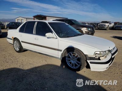 Czwarte zdjęcie samochodu z boku: 1991 HONDA ACCORD LX VIN:1HGCB7657MA131432 - miniatura