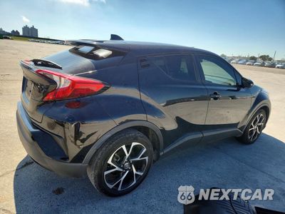 Trzecie zdjęcie samochodu z tyłu: 2021 TOYOTA C-HR XLE VIN:JTNKHMBX1M1113082 - miniatura