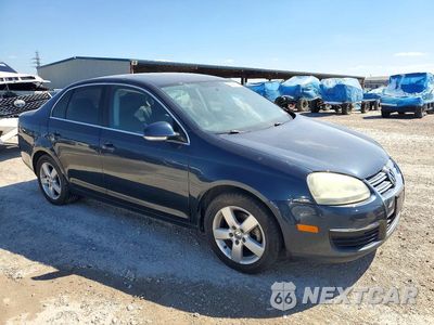 Czwarte zdjęcie samochodu z boku: 2009 VOLKSWAGEN JETTA SE VIN:3VWRM71K29M037871 - miniatura
