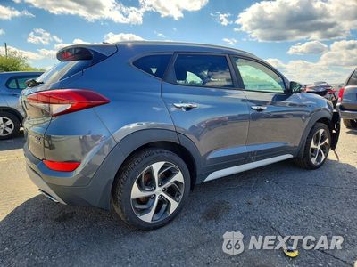 Trzecie zdjęcie samochodu z tyłu: 2018 HYUNDAI TUCSON LIMITED VIN:KM8J3CA25JU750240 - miniatura