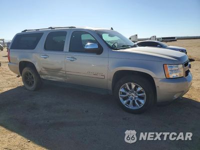 Czwarte zdjęcie samochodu z boku: 2007 CHEVROLET SUBURBAN K1500 VIN:3GNFK16347G217222 - miniatura