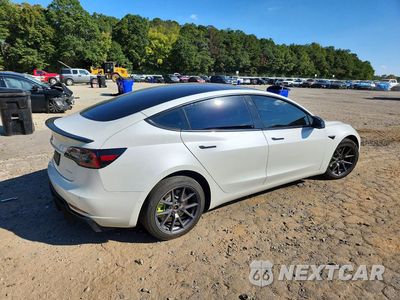 Trzecie zdjęcie samochodu z tyłu: 2021 TESLA MODEL 3 VIN:5YJ3E1EB9MF872635 - miniatura