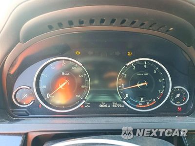 Zdjęcie 9 z 12 samochodu: 2014 BMW 750 LXI VIN:WBAYF8C50ED652928 - miniatura