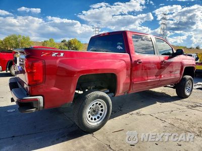 Trzecie zdjęcie samochodu z tyłu: 2018 CHEVROLET SILVERADO K1500 LT VIN:3GCUKREC9JG319669 - miniatura