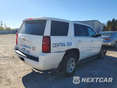 Trzecie zdjęcie samochodu z tyłu: 2019 CHEVROLET TAHOE K1500 VIN:1GNSKEEC4KR275959 - miniatura
