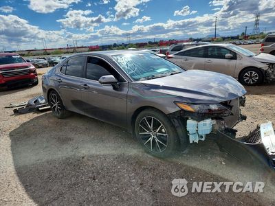 Czwarte zdjęcie samochodu z boku: 2022 TOYOTA CAMRY SE VIN:4T1T11AK1NU048456 - miniatura