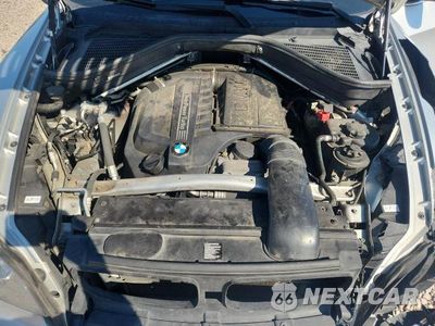 Zdjęcie 12 z 13 samochodu: 2013 BMW X5 XDRIVE35I VIN:5UXZV4C51D0E13267 - miniatura