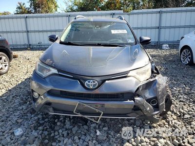 Piąte zdjęcie samochodu w środku: 2017 TOYOTA RAV4 HYBRID XLE VIN:JTMRJREV1HD127003 - miniatura