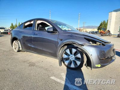 Czwarte zdjęcie samochodu z boku: 2022 TESLA MODEL Y VIN:7SAYGDEEXNF551929 - miniatura