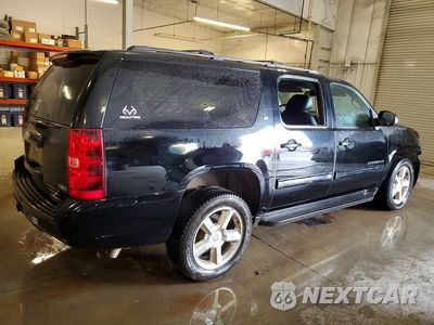 Trzecie zdjęcie samochodu z tyłu: 2011 CHEVROLET SUBURBAN C1500 LT VIN:1GNSCJE05BR294421 - miniatura