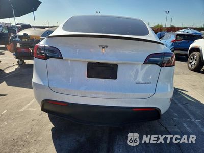 Zdjęcie 6 z 12 samochodu: 2023 TESLA MODEL Y VIN:7SAYGDEF5PF804618 - miniatura